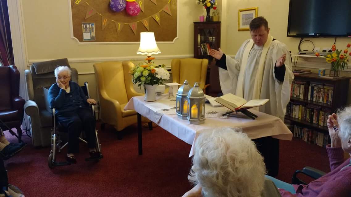 Fr John celebrating mass at his care home Fr John celebrating mass at his care home
