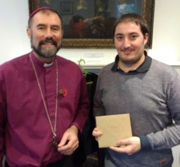 Ruben with Bishop Adrian on being admitted to the minor order of Doorkeeper Ruben with Bishop Adrian on being admitted to the minor order of Doorkeepe